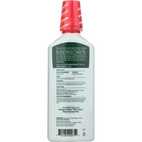 The Natural Dentist Healthy Gums Mouth Rinse bottle with herbal ingredients.