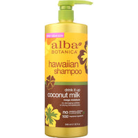 Alba Botanica Drink It Up Coconut Milk Shampoo bottle with coconut and flower accents on a white background.